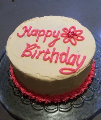 Birthday cake with pink piping